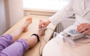 Patient nerves testing using electromyography at medical center